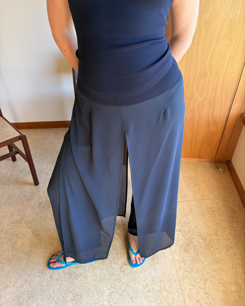 CASETTE PANT NAVY | Vintage inspired pant designed in a luxe navy chiffon. This pant features a floaty over-layer that glides with you as you walk and a high waisted fit. Dress up by adding your favourite blazer, or pair with your favourite tank...