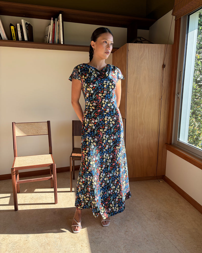 TALIA TIE BACK MAXI DRESS SPRINKLE FLORAL | Bias-cut maxi dress, designed in our light-weight sprinkle floral viscose. Featuring a cowl neckline, split cap sleeves and a lace up back to cinch in the waist, this is the perfect dress for any wedding or special event. 