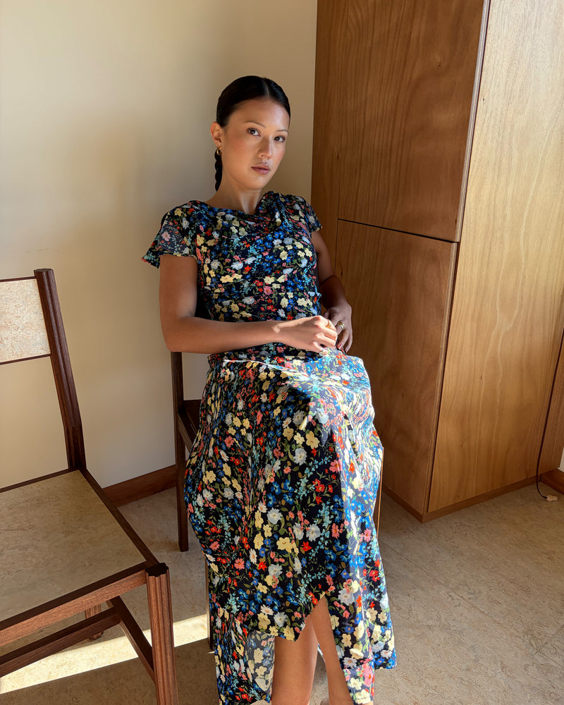 TALIA TIE BACK MAXI DRESS SPRINKLE FLORAL | Bias-cut maxi dress, designed in our light-weight sprinkle floral viscose. Featuring a cowl neckline, split cap sleeves and a lace up back to cinch in the waist, this is the perfect dress for any wedding or special event. 