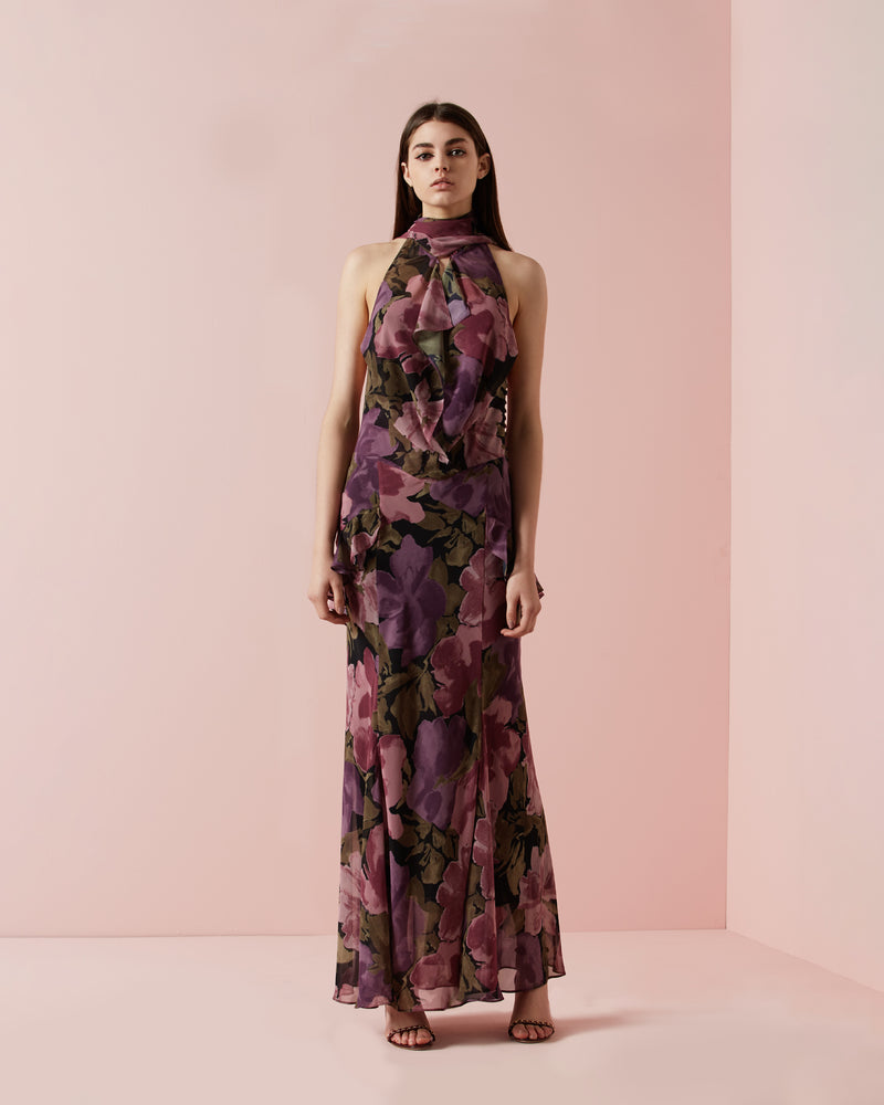 BELLADONNA GOWN FLORAL | Full length bias cut backless gown with signature RUBY floral print, double layer front bodice, ruffle detail on sides, side button closure and long adjustable neck ties.