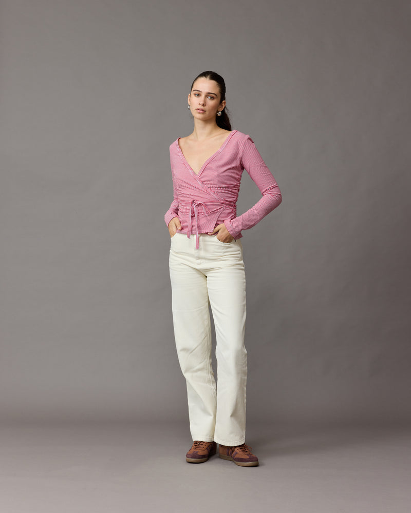MISSY JEAN CREAM | A classic pair of high-waisted straight-leg jeans cut in a cream denim. The straight leg silhouette accentuates your body while making your legs look longer.
