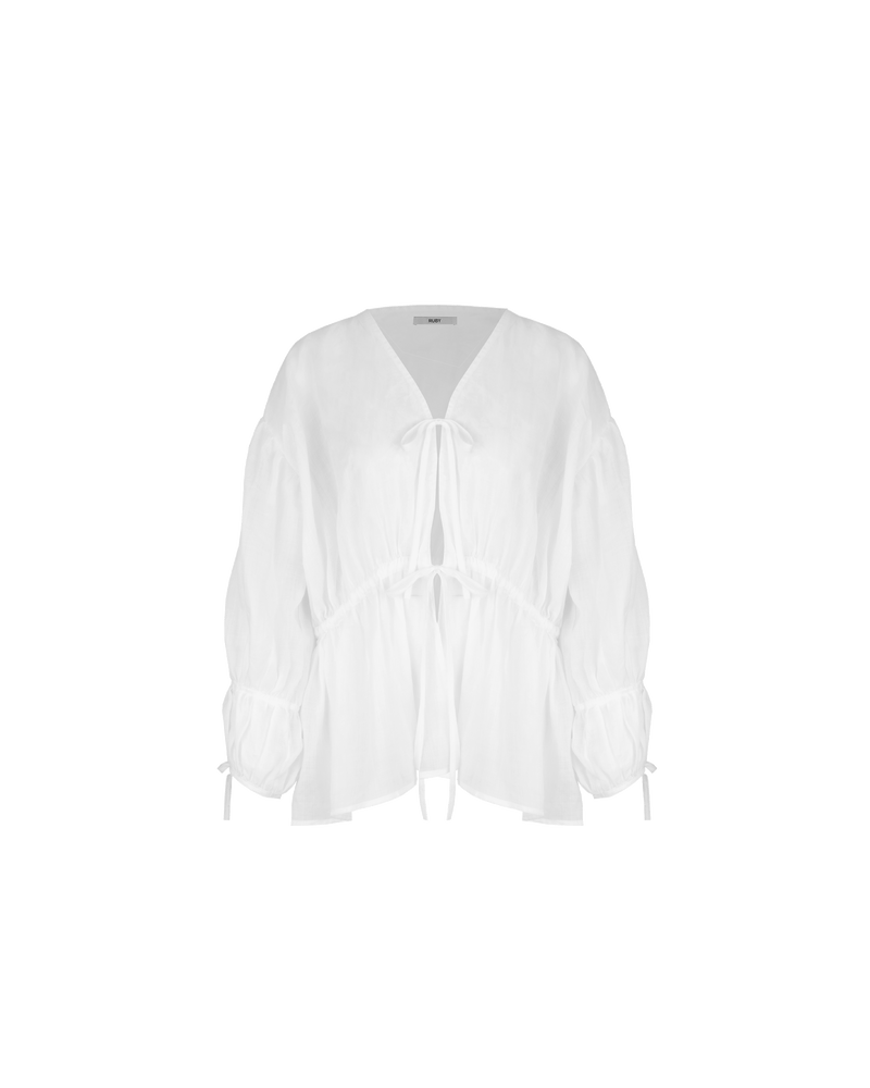 HYDRA TIE BLOUSE WHITE | Floaty long sleeve blouse with a V-neckline and ties at the centre front made from a delicate translucent ramie voile. This blouse features a drawstring so you can wear this...