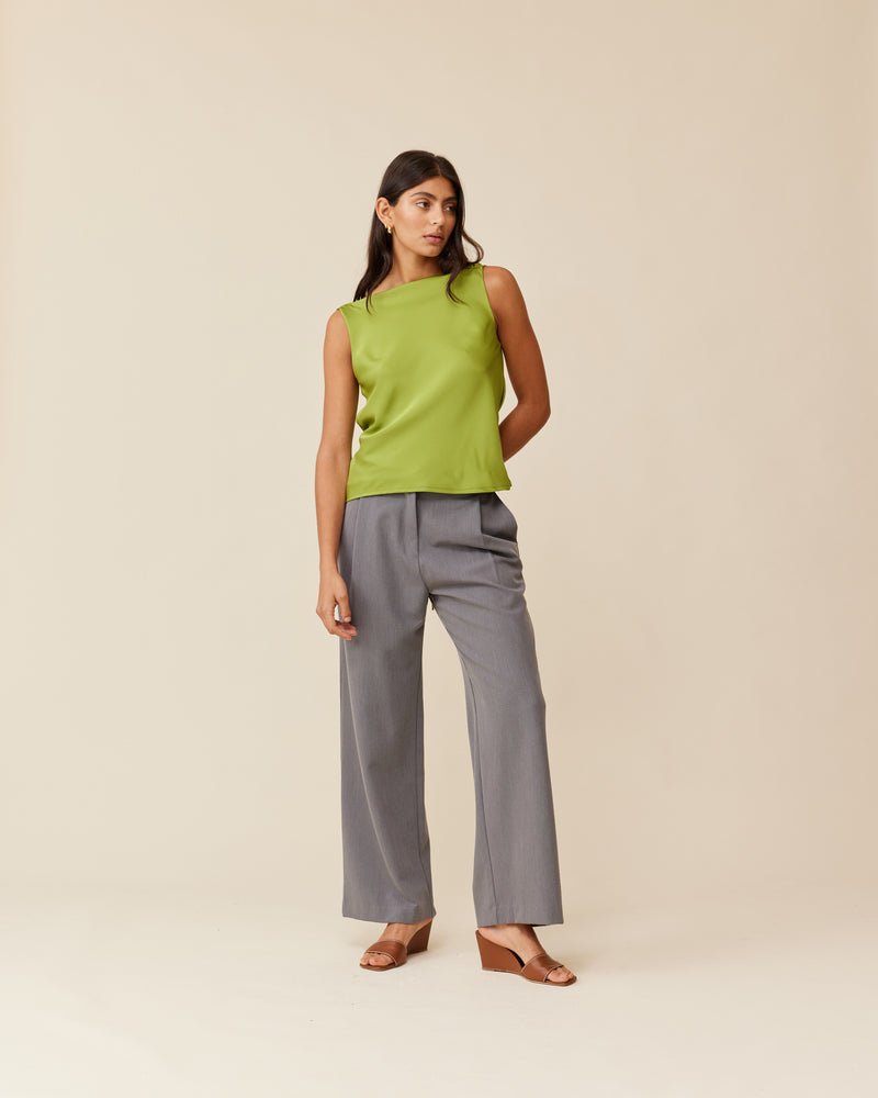 FIREBIRD COWL SLEEVELESS TOP PEA GREEN | Sleeveless top crafted in a luxe pea green satin. Features a minimal silhouette with a cowl back detail and a tie to cinch in the waist.