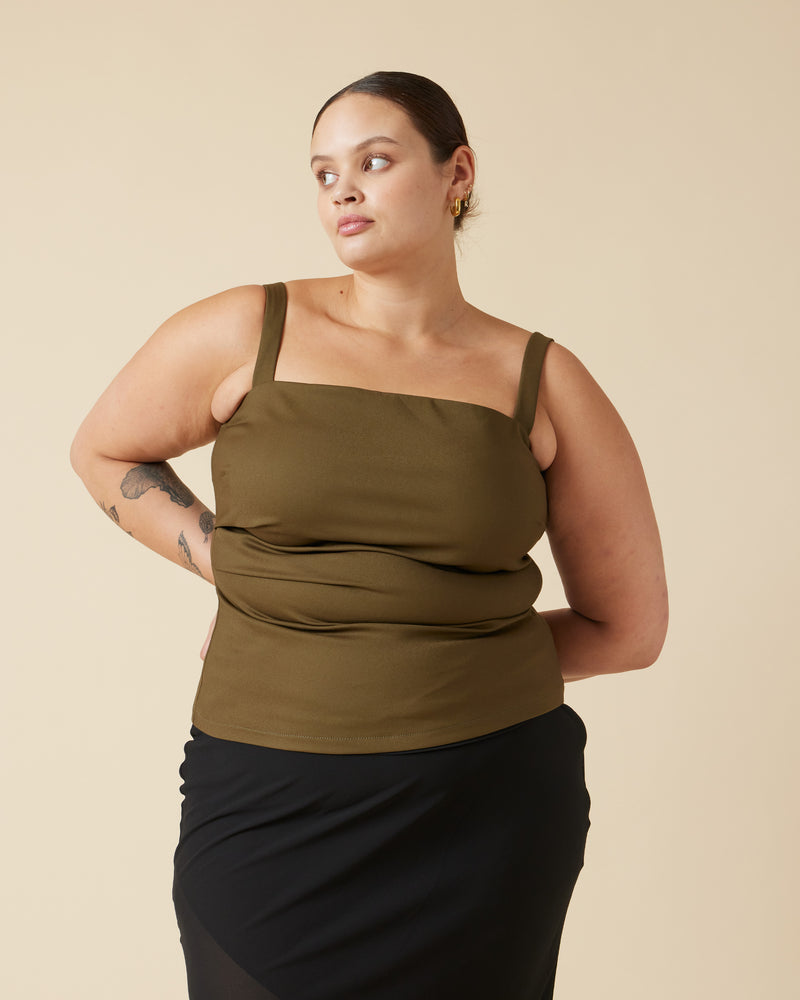 JUPITER EXTENDED BODICE KHAKI | Fitted bodice with wide straps designed in a stretch bengaline fabric. This top features tuck detailing throughout which cinches the waist. This is an updated version of the Jupiter Bodice that...