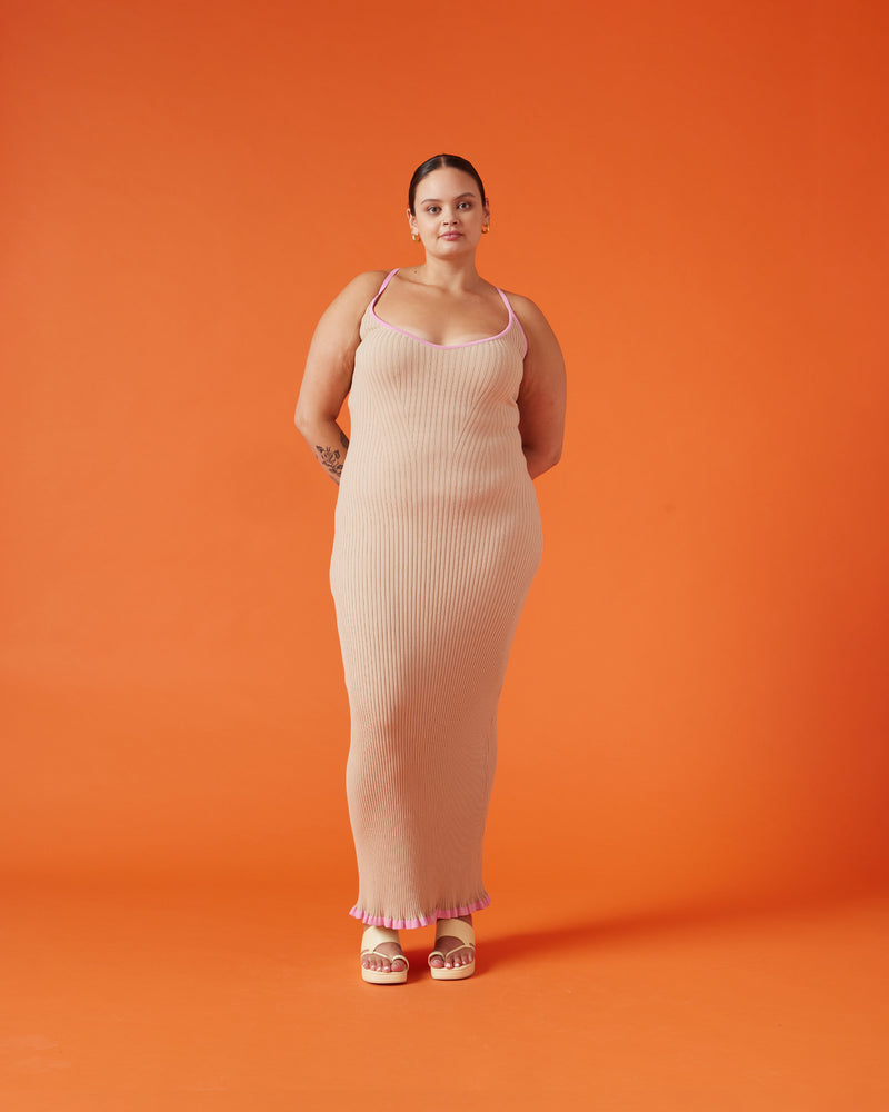 RINA DRESS STRAWBERRY BISCUIT | Ribbed knitted maxi dress designed in a two tone biscuit and strawberry colour way. This staple dress can be worn many ways by adjusting the straps, giving you 4 options in 1.