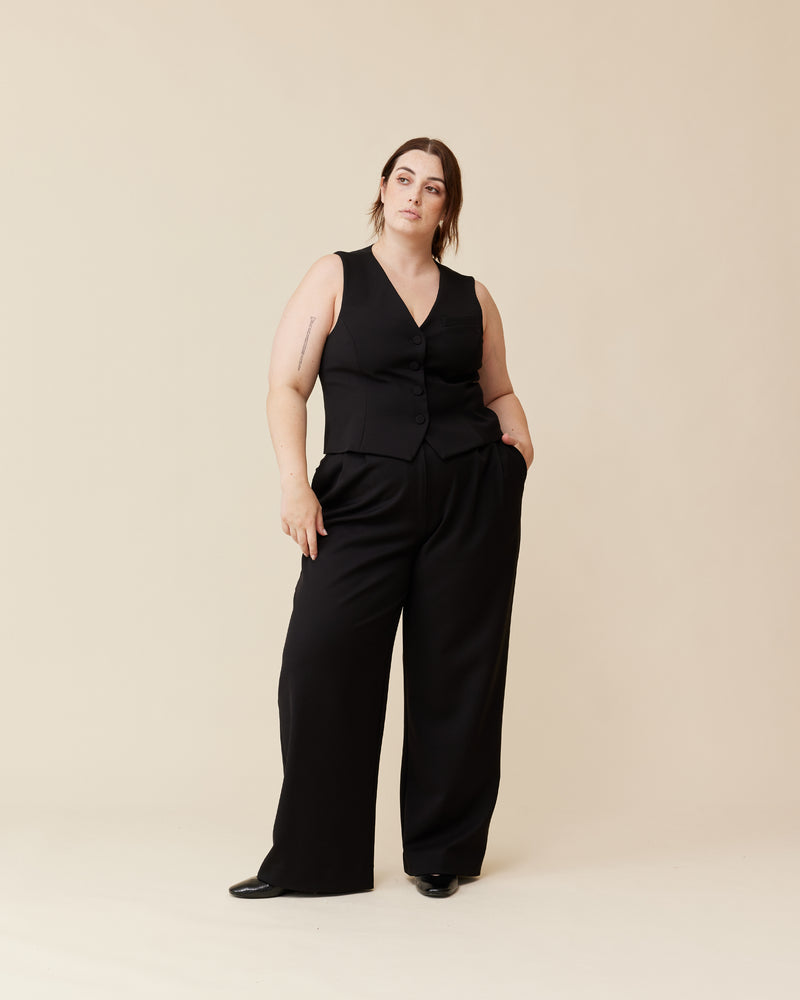 SWEENEY TROUSER BLACK | High waisted, relaxed suit trouser in black. Beautifully tailored pants with neatly pressed pleats that highlight the shape.
