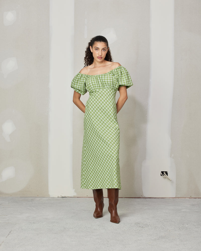 APPLE MIDI DRESS APPLE GINGHAM | Puff sleeve midi dress designed in an apple gingham fabric. This dress has a gathered bodice and falls to a bias cut skirt and can be worn on or off...