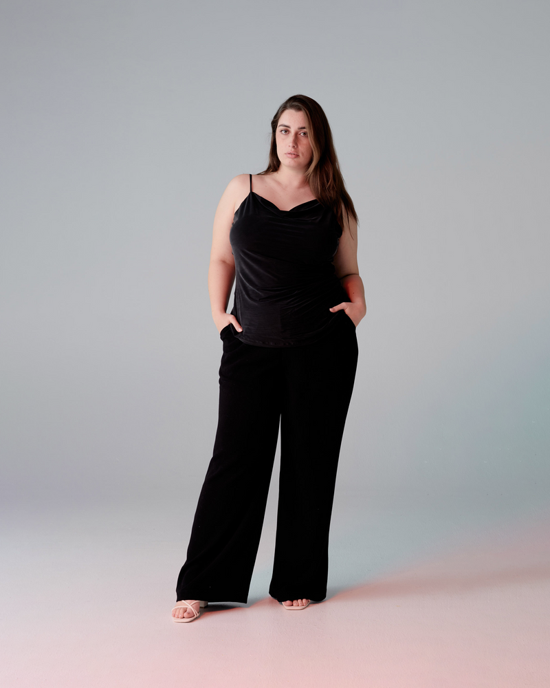 ATLANTA CAMISOLE BLACK | Asymmetric shoulder top, in a slinky knit that hugs the form in all the right places. Gathered detail down side seam creates ruching that gently emphasizes the contours of your...