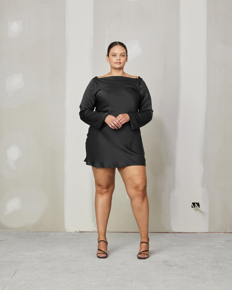 FIREBIRD SATIN COWL MINIDRESS BLACK | 
Long sleeve mini dress crafted in lush black satin. A minimal silhouette with a cowl back detail and a tie to cinch in the waist.
