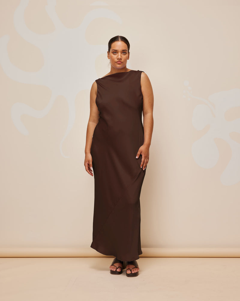 FIREBIRD COWL GOWN ESPRESSO | Sleeveless midi dress crafted in rich espresso satin. Features a minimal silhouette with a cowl back detail and a tie to cinch in the waist.