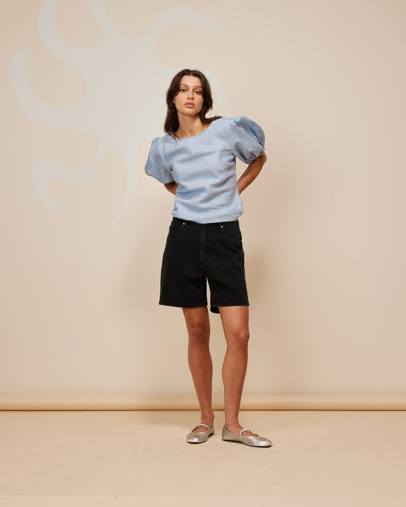 SOLAR RELAXED SHORT BLACK | Vintage inspired high waisted short designed in a black wash mid-weight cotton denim. Sitting slightly A-line and offering a longer length fit, these shorts sit relaxed and easy in the warmer...