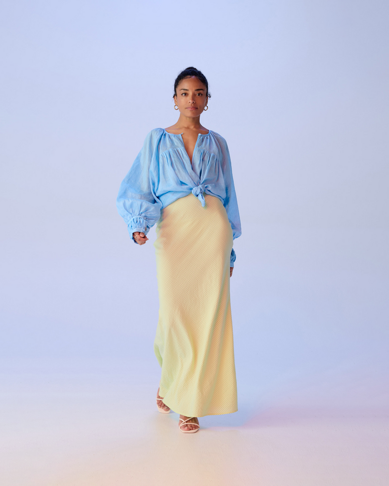 KAI BLOUSE OCEAN | Oversized flowy blouse with self-covered button closure at the neckline, made from a delicate translucent ramie voile. Floaty in form, this blouse is a transeasonal staple.