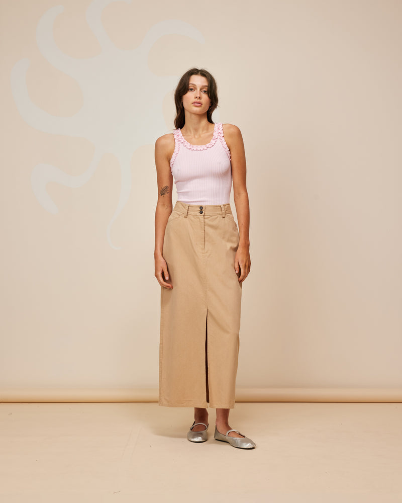 RAFFIA SKIRT CAMEL | Straight fit midi skirt cut from a mid-weight tan cotton drill. A timeless staple that features a front split for movement and pockets to house your essentials.