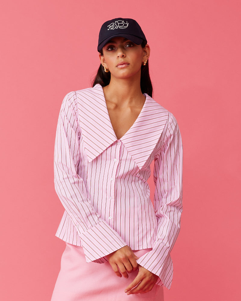 EDDIE SHIRT PINK RED STRIPE | A RUBY spin on a classic shirt shape, meet Eddie, a pink and red striped shirt that will bring fun into your wardrobe. Features a close fit that nips in...