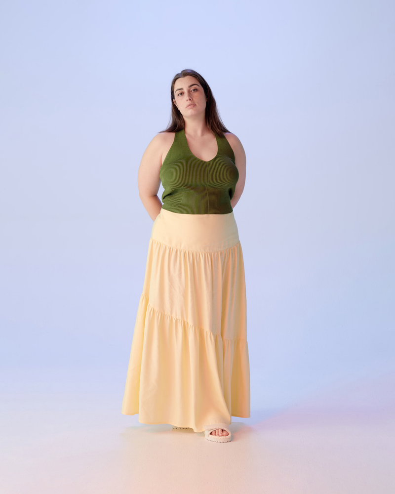 BONITA LINEN SKIRT BUTTER | Tiered maxi skirt crafted in a soft butter coloured linen. A fitted top waist panel contrasts against two gathered tiers giving this piece a floaty appearance and feel.