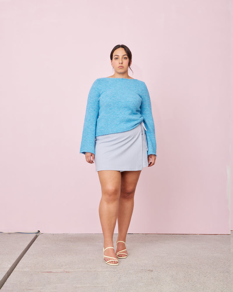 MILO SWEATER TOPAZ | 90's inspired sweater knitted in a soft fluffy wool blend. Features flared sleeves and a mid weight which make it great for layering as the weather cools.