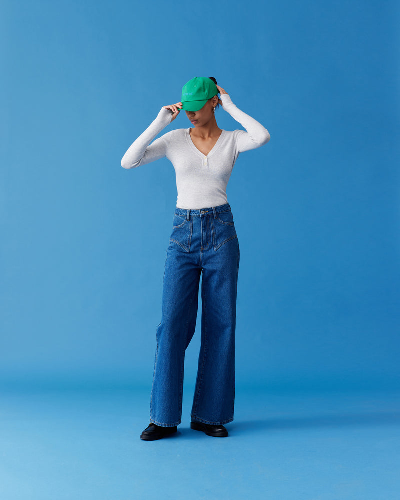 CLOVER JEAN INDIGO | The Clover Jean is the classic high waisted flared jean in an indigo denim wash. Retro four pocket detailing with contrast top stitching. Made in a soft denim with light...