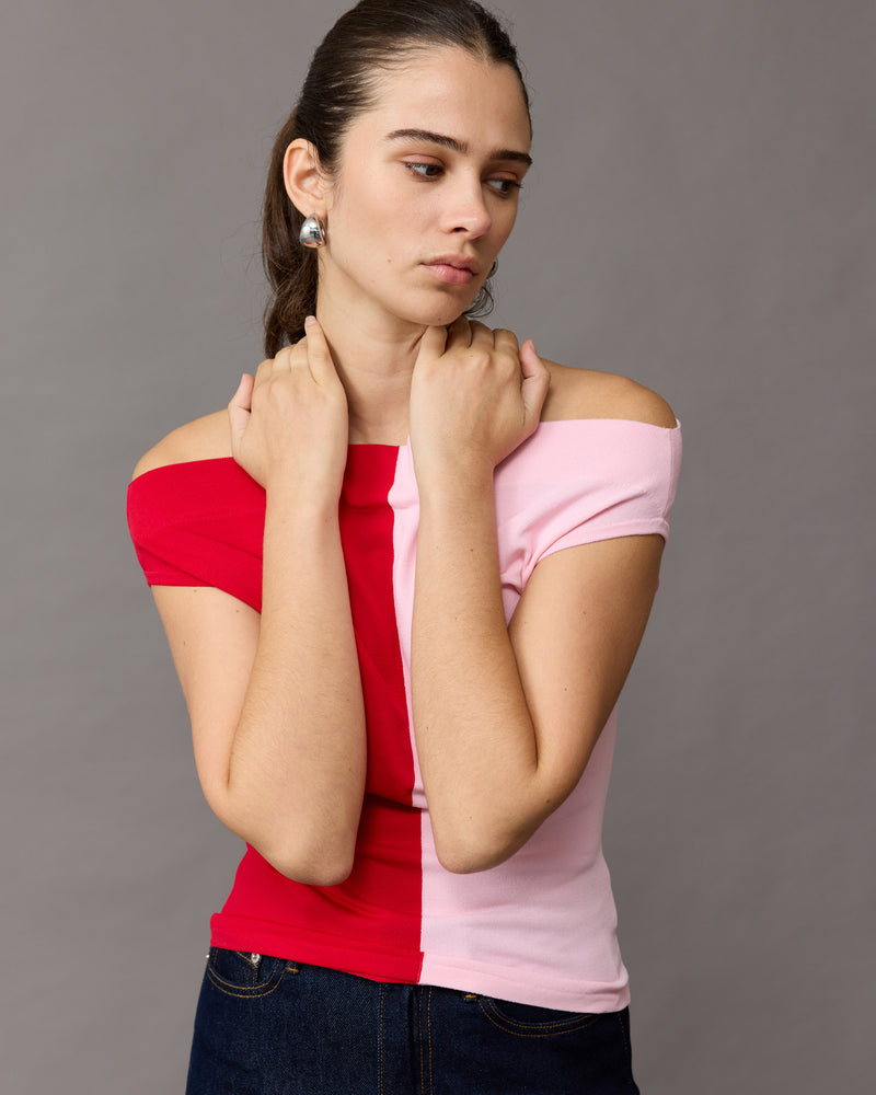 EMMA KNIT TOP PINK CHERRY | Off-shoulder knitted top crafted in a mid-weight two-toned knit. This top is simple yet elegant and can be worn on or off the shoulder.