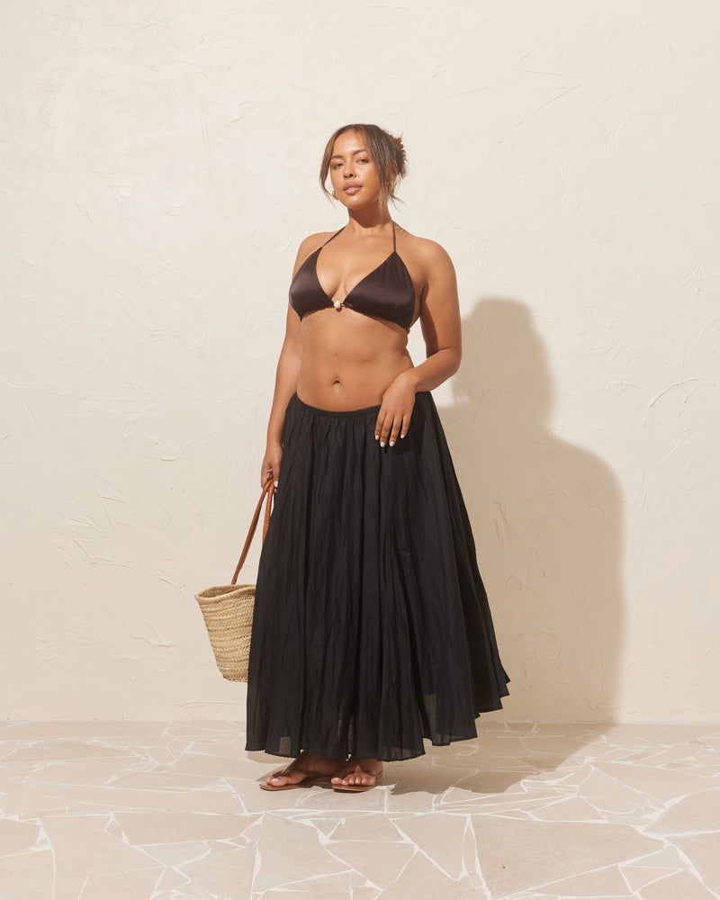 HYDRA SKIRT BLACK | Gathered maxi skirt designed in a textured raime voile. This skirt sits light and floaty, with a flat waistband. Truly the perfect summer staple. 