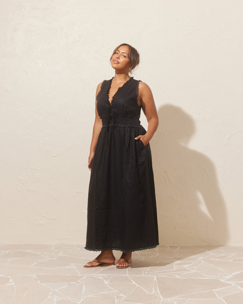 BENNY TIE DRESS BLACK | An update on a Rubette favourite, this maxi dress is imagined in a soft linen with lace trim detailing. Features a panel detail at the waist with two ties and...