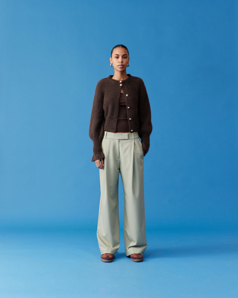 RUE TROUSER SAGE | Straight-leg mid-waist suit trouser with a flat waistband and belt loops. These pants are versatile in that they can we be worn casual with a baby tee, or make it...