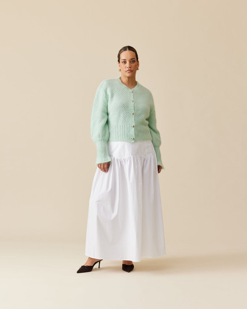 TRULLI SKIRT WHITE | Floaty basque style maxi skirt imagined in a white cotton poplin fabric. This skirt features a bodice-style waistline, that falls to a full, wide skirt.