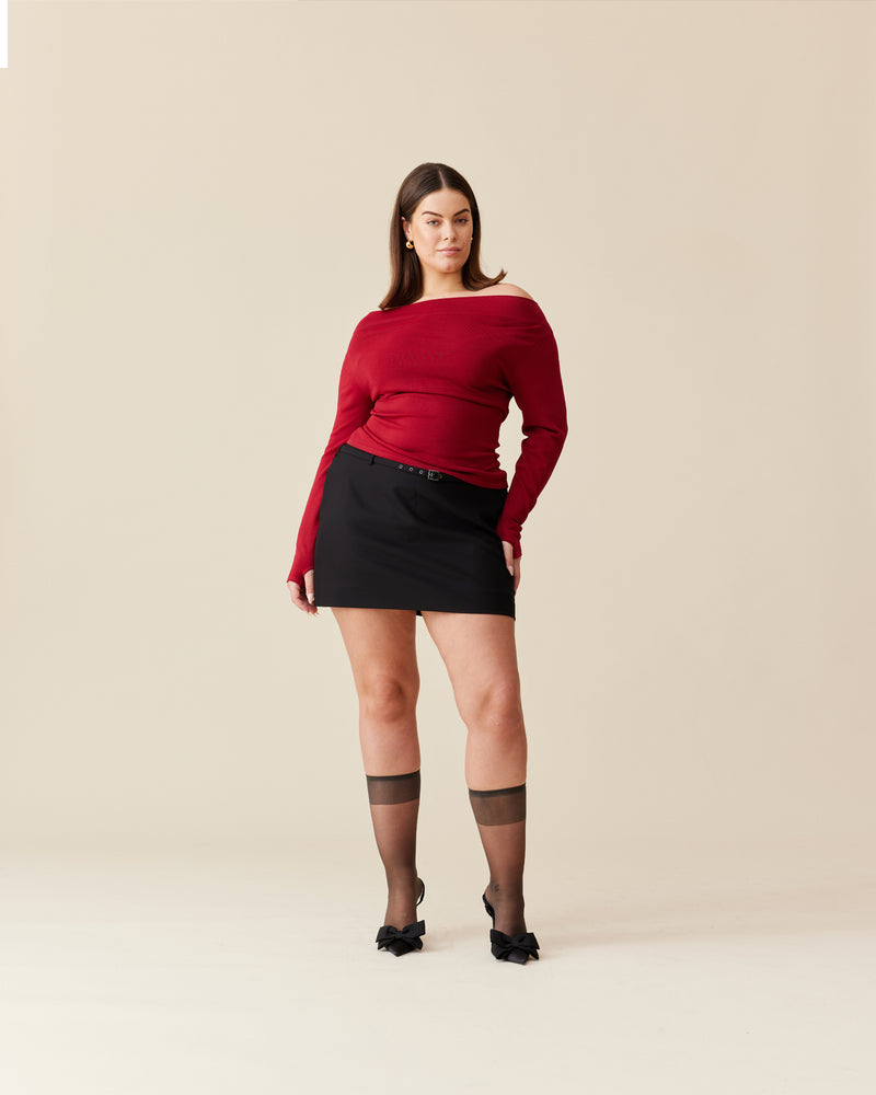 EMMA KNIT LONG SLEEVE SANGRIA | Off-shoulder long sleeve knitted top crafted in a mid-weight knit. This top is simple yet elegant and can be worn on or off the shoulder.