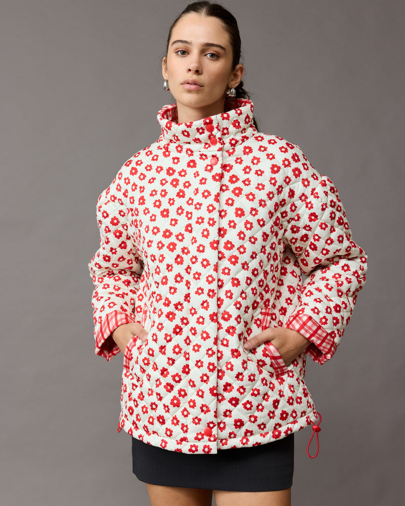 HARRIET JACKET RED DAISY | Quilted padded jacket, designed with a relaxed fit with generous sleeves, meaning it will easily layer over your chunkiest knits. This jacket has a high, stand up collar with snap...