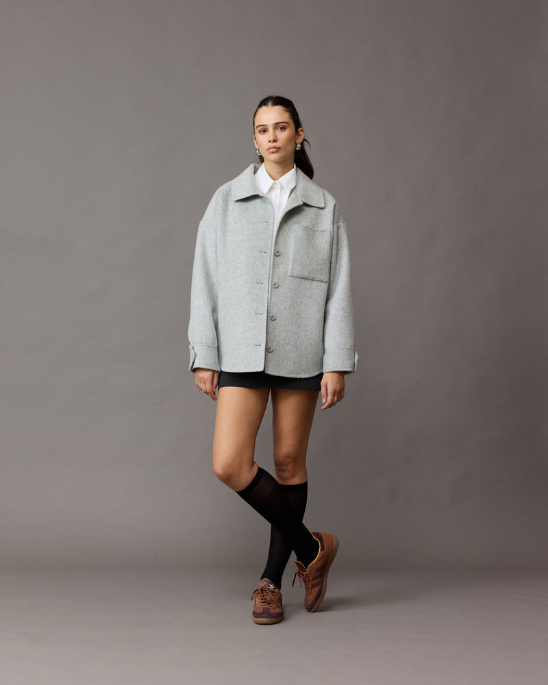 SIAN JACKET GREY MARLE | Shirt style jacket, designed in a grey wool blend with grey buttons. This piece is great to layer with sweaters and coats as the weather cools.