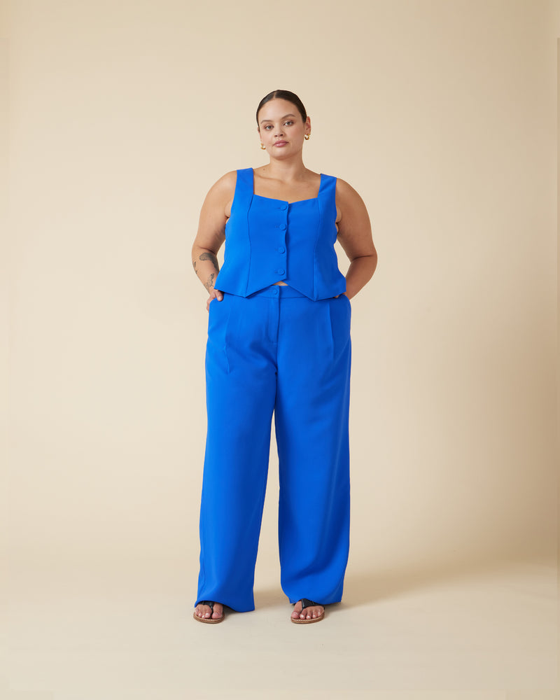 SID VEST COBALT | Waist length suit vest with a sweetheart neckline designed in a striking cobalt colour. Featuring paneling down the front and back, this vest is perfect for spring suiting.