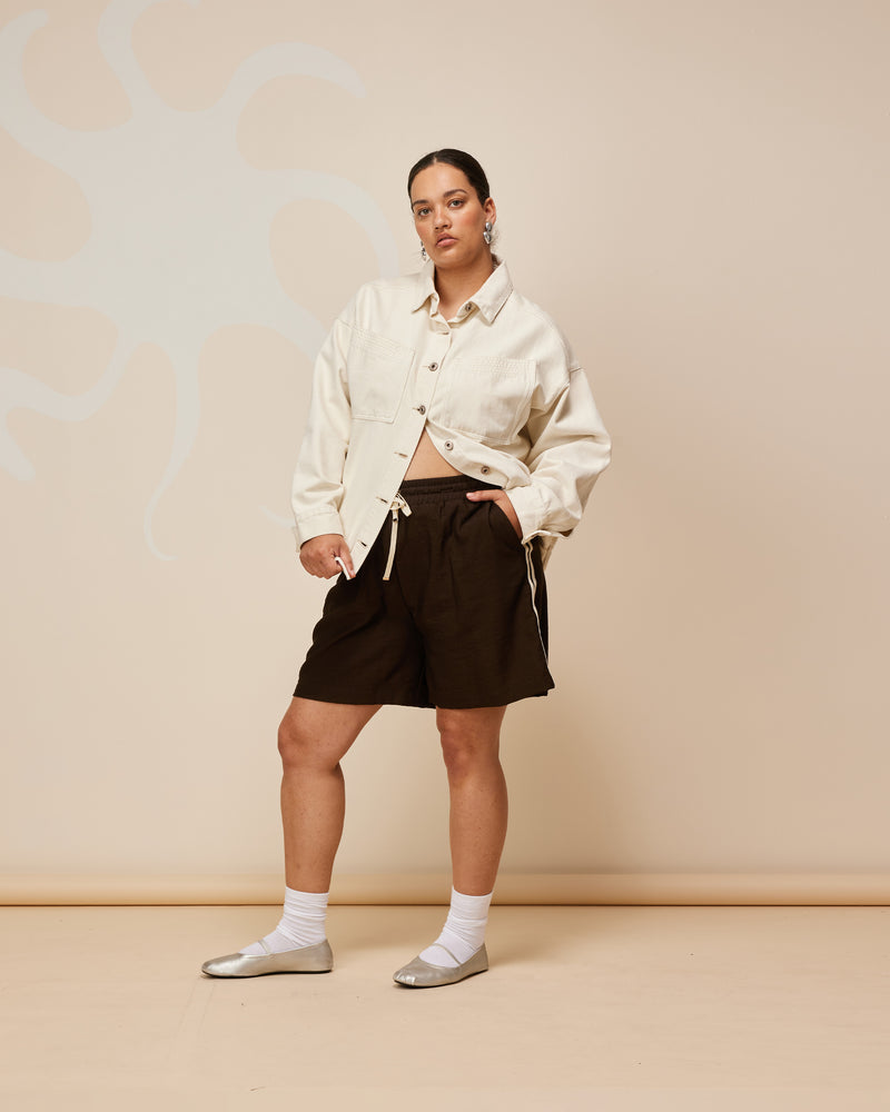 CORVETTE SHORT CHOCOLATE | We've given this Rubette favourite an update for the warmer weather! Enter the Corvette Short. Sits mid-thigh with a relaxed leg. Features a sporty double stripe down the side seams, an...