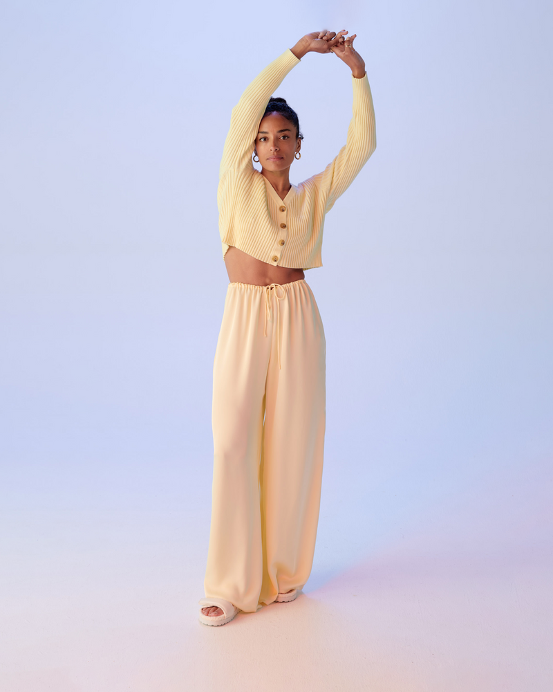 ANDIE SATIN PANT BUTTER | Palazzo style elastic waist pants with a tie, in a luxurious butter coloured satin. These pants are high waisted, uncomplicated and classically cool.