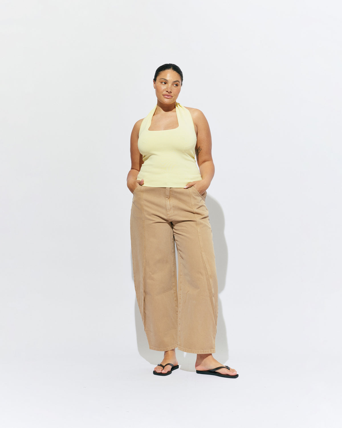 BUZZ JEAN SANDWASH | Your new everyday go-to, the Buzz Jean is a barrel-leg style pant, designed in a sandwash denim. Sits mid-waisted and features panel detailing down the front that wraps to the side seam.