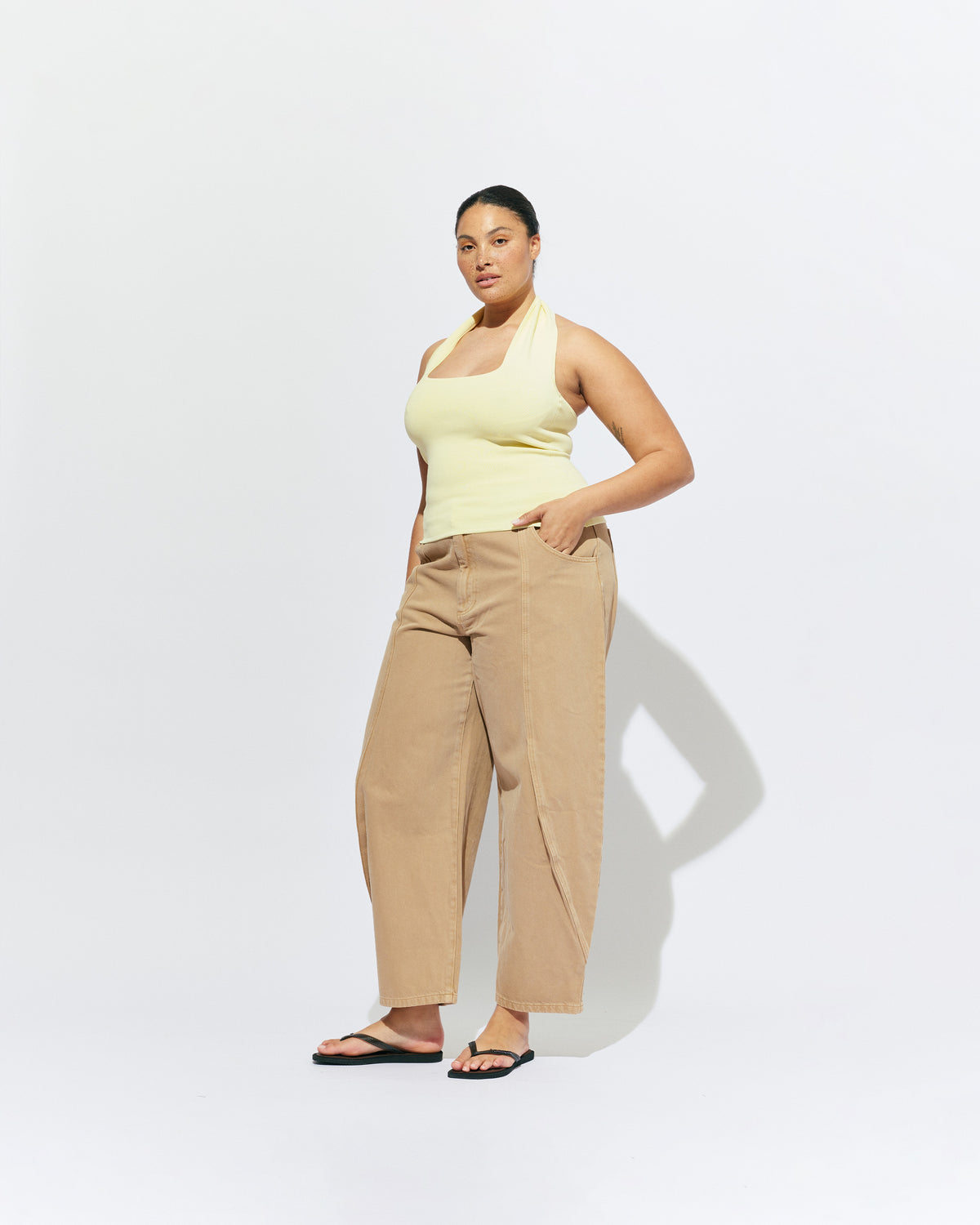 BUZZ JEAN SANDWASH | Your new everyday go-to, the Buzz Jean is a barrel-leg style pant, designed in a sandwash denim. Sits mid-waisted and features panel detailing down the front that wraps to the side seam.
