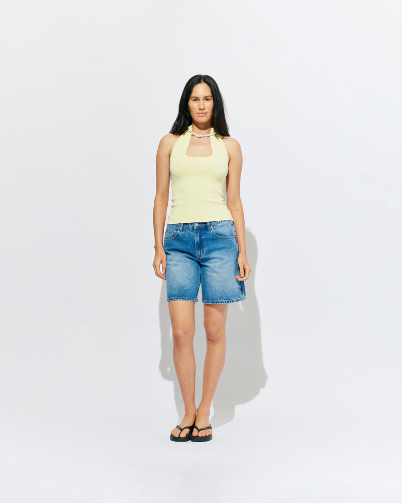 RUDI TANK BUTTER | A twist on the classic halter tank with an oversized strap designed to sit gathered around the neckline, crafted in a mid-weight butter knit. This tank is designed to be worn tight and hold you in when worn. Pair with...