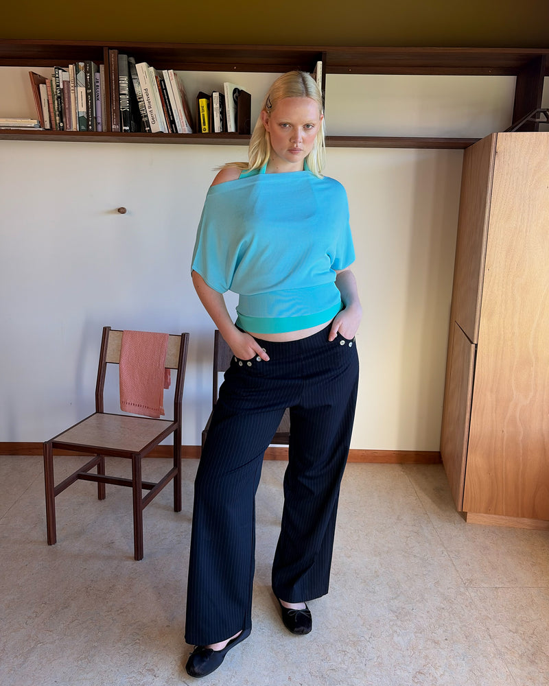 CAROLYN PANT NAVY PINSTRIPE | Classic high waisted navy pinstripe pant with an elevated twist ~ straight leg silhouette, designed in a mid weight suiting fabric and with feature shell buttons along the pockets. Make it a matching set with our Carolyn Blazer or Coco...