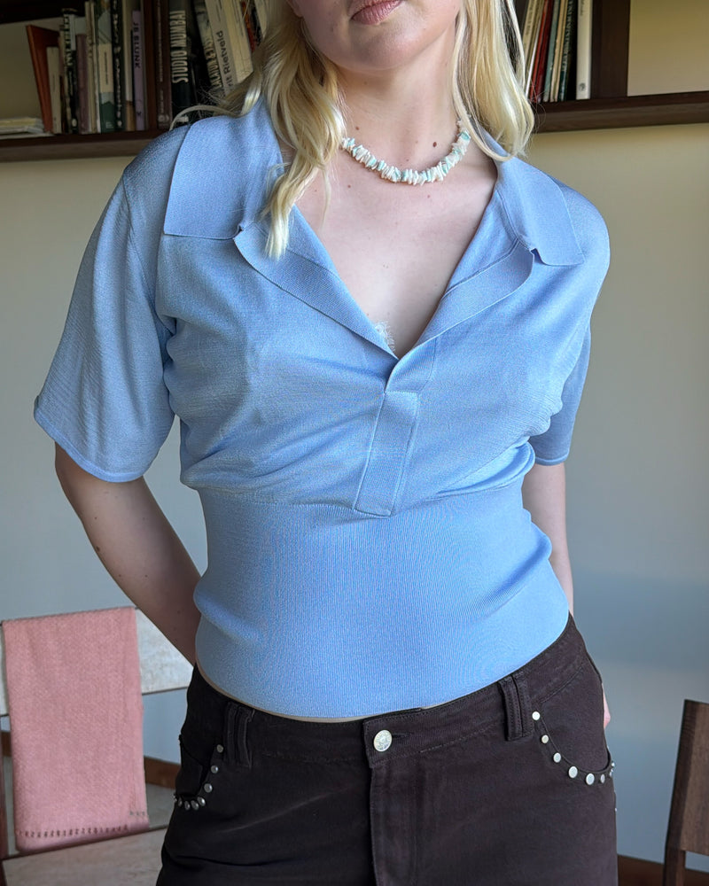 RAMONA SHORT SLEEVE POLO TOP SERENITY | An update to our Ramona Polo Top, this short sleeve knit is designed in our dreamy serenity blue, featuring a collar and wide V-neckline. Paired with denim or your favourite skirt, this top is a staple for your everyday wardrobe.