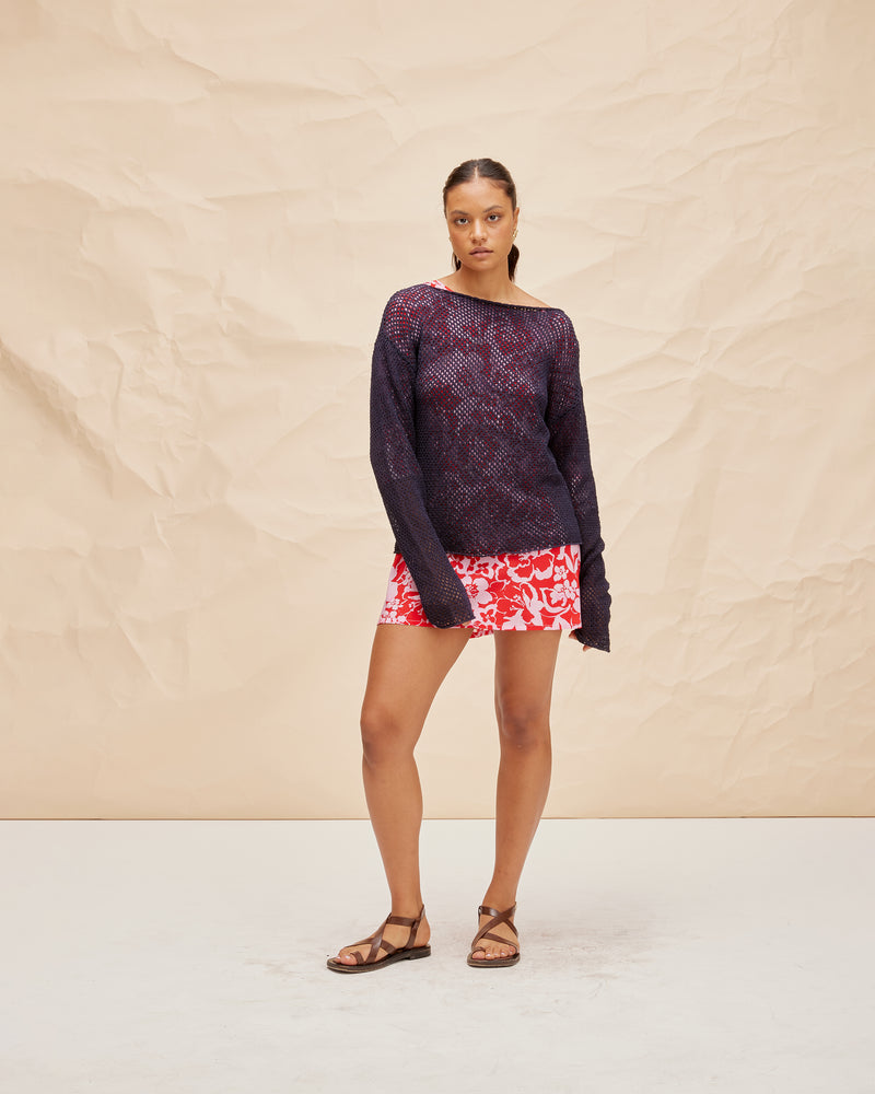 SPRITZ LONG SLEEVE NAVY | Long sleeve netted crochet top with a high boat neckline. Crotched in a luxe cotton, this top is the perfect summer-weight knit.