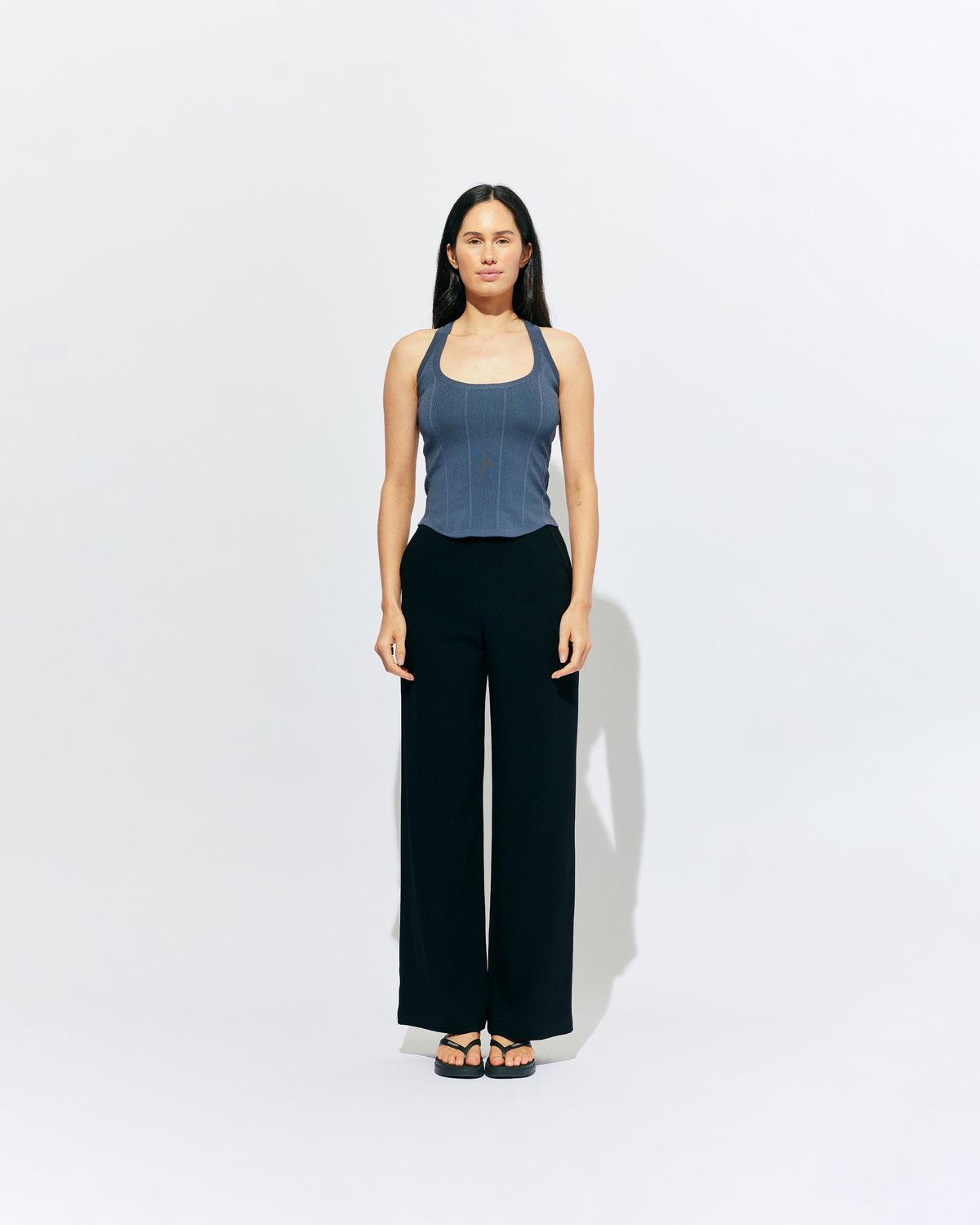 SOL TANK BLUE SLATE | A wardrobe staple for all year round, this classic racerback tank top is designed in a mid-weight blue slate knit. Wear as a base layer in cooler weather, or as an everyday go to during the warmer months. 