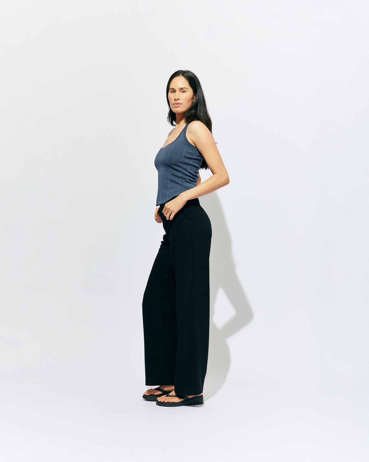 SOL TANK BLUE SLATE | A wardrobe staple for all year round, this classic racerback tank top is designed in a mid-weight blue slate knit. Wear as a base layer in cooler weather, or as an everyday go to during the warmer months. 