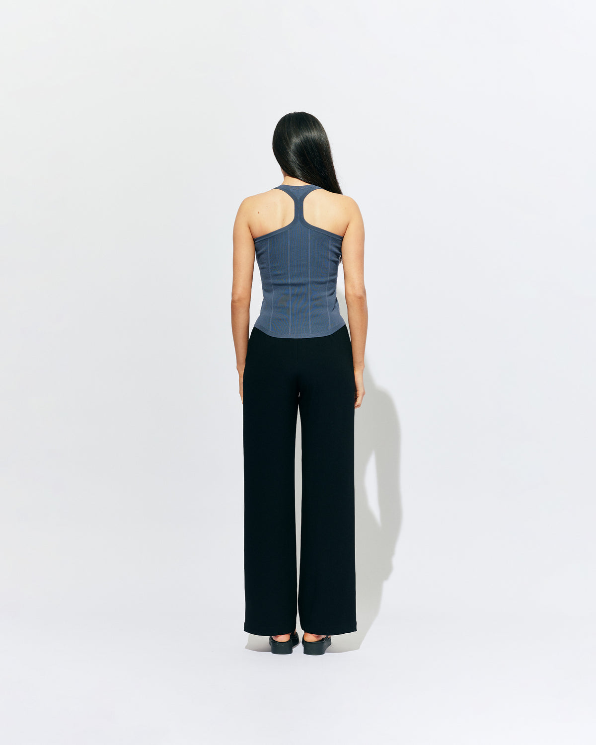 SOL TANK BLUE SLATE | A wardrobe staple for all year round, this classic racerback tank top is designed in a mid-weight blue slate knit. Wear as a base layer in cooler weather, or as an everyday go to during the warmer months. 