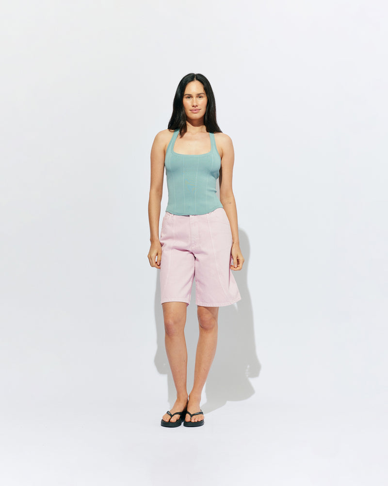 BUZZ SHORT PINK | Our RUBY favourite Buzz Jeans, now available in shorts. Designed in a soft pink denim, these mid-rise shorts have a longer length fit and a wide leg shape, making them perfect for any summer occasion. 