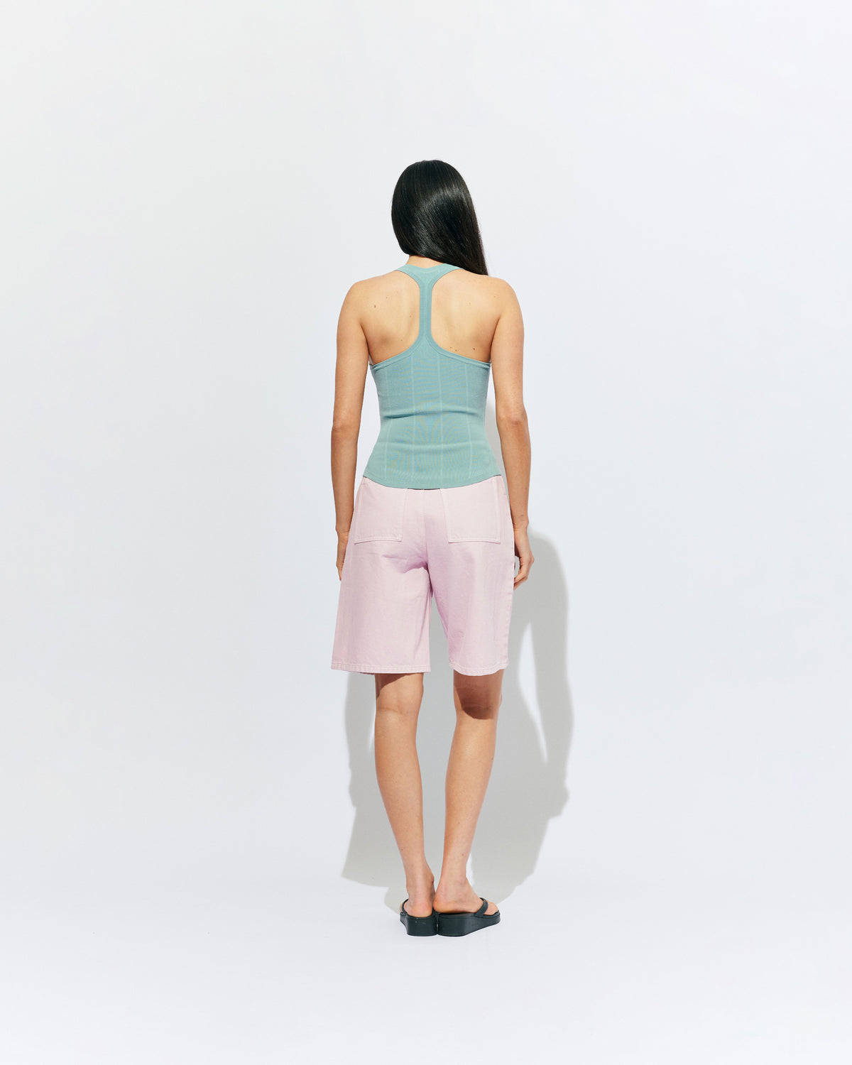 SOL TANK SEAFOAM | A wardrobe staple for all year round, this classic racerback tank top is designed in a mid-weight seafoam knit. Wear as a base layer in cooler weather, or as an everyday go to during the warmer months. 