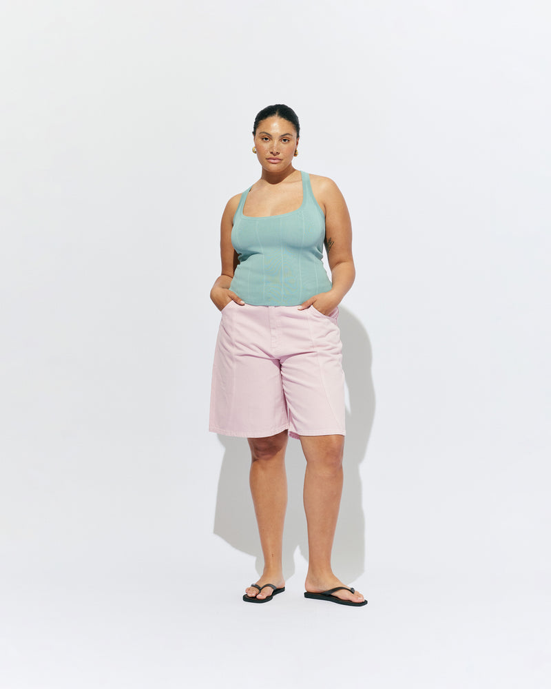 BUZZ SHORT PINK | Our RUBY favourite Buzz Jeans, now available in shorts. Designed in a soft pink denim, these mid-rise shorts have a longer length fit and a wide leg shape, making them perfect for any summer occasion. 