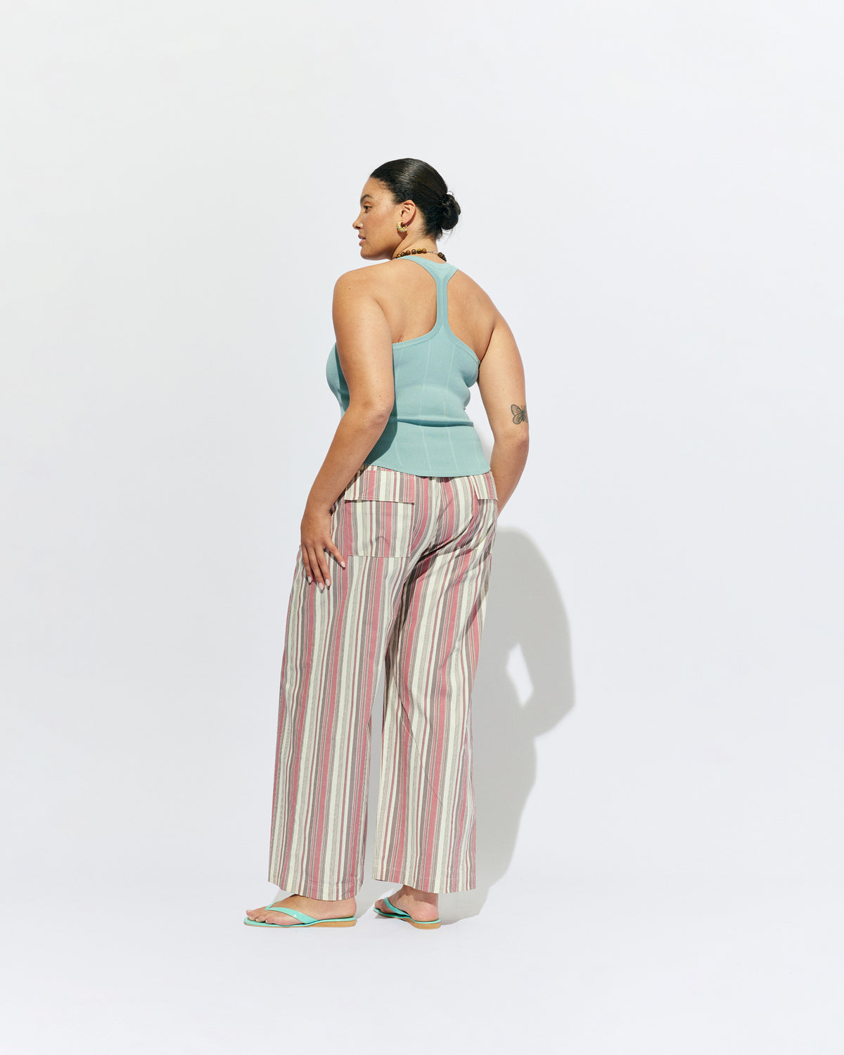 SONNY PANT ANISE STRIPE | Straight leg cotton pant with a flat elastic waistband, designed in our anise striped cotton. These pants sit relaxed and wide and have side and back pockets, with a feature embroidered RUBY 'R' on the back pocket. Make it a...