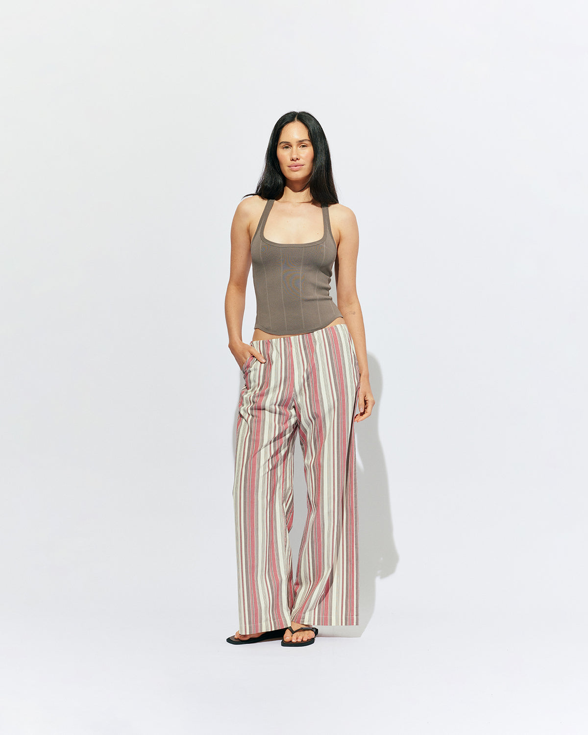 SOL TANK TAUPE | A wardrobe staple for all year round, this classic racerback tank top is designed in a mid-weight taupe knit. Wear as a base layer under your winter favourites, or as an everyday go to during the warmer months. 
