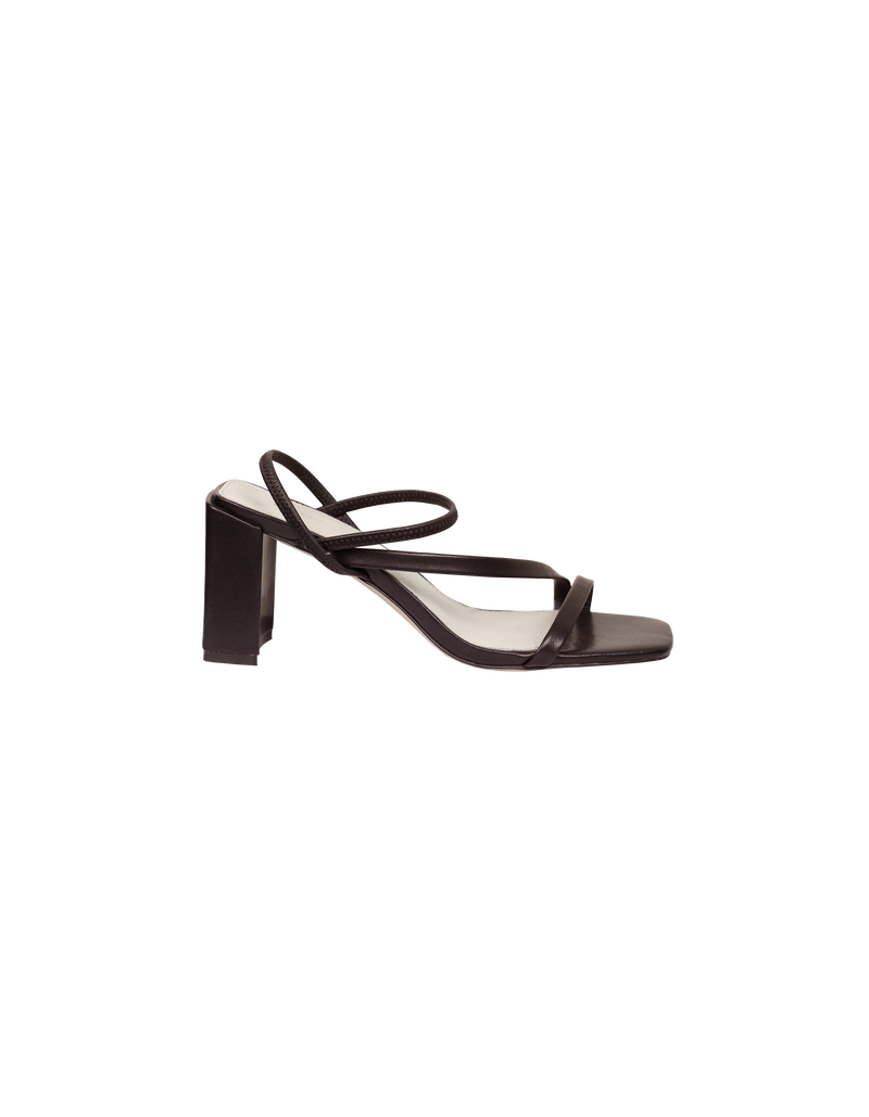 TIA HEEL JAVA | Square toe heel with straps around the ankle and across the front of the foot. A square block heel adds height but makes these shoes sturdy, while the ankle strap...