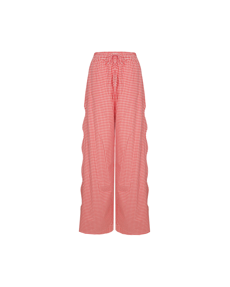 TRULLI PANT RED GINGHAM | Mid-waist cotton pant designed in a red gingham. Features wave cut-outs down the outside of the legs, making these a fun summer piece.