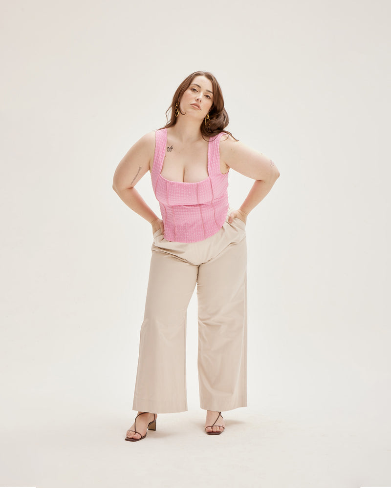 VITTORIA BODICE  PINK | Fitted crop bodice with a square neckline in a new pink gingham. Vertical panels add to the structured shape of this bodice, while visible seams across these panels add texture...