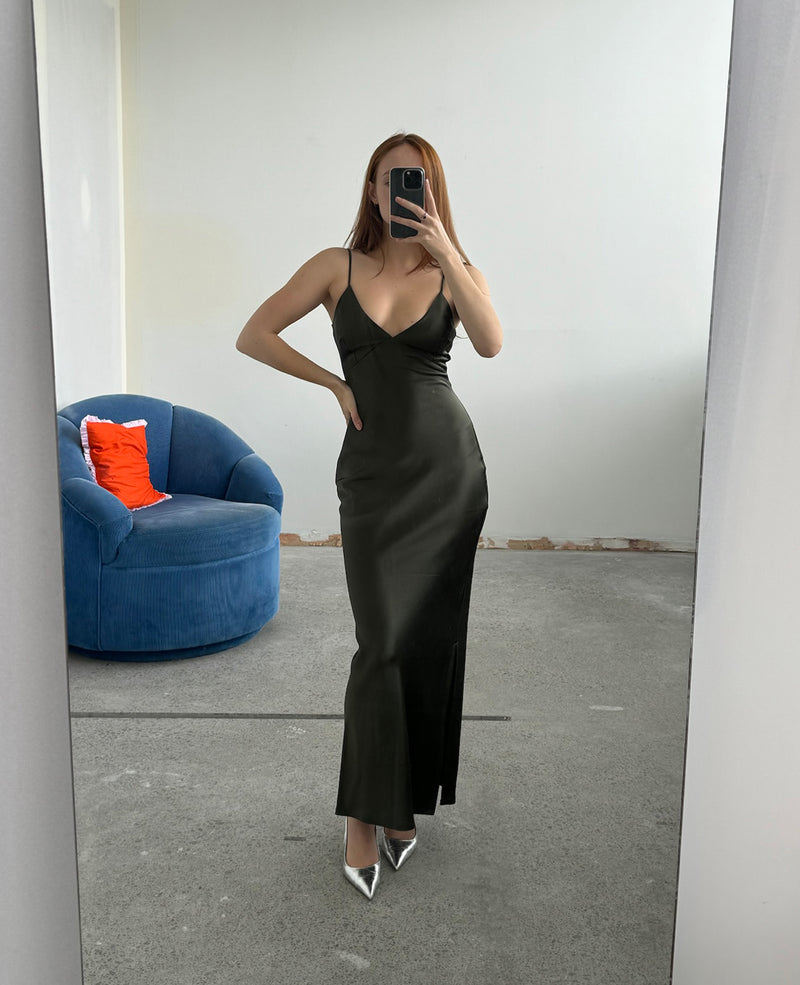 WEIRDLY SLIP JETTA GREEN | Iconic bias cut slip dress with plunging neckline in a new longer length. A wardrobe staple in heavy weight double satin that is lush to wear, in a sheeny jetta...